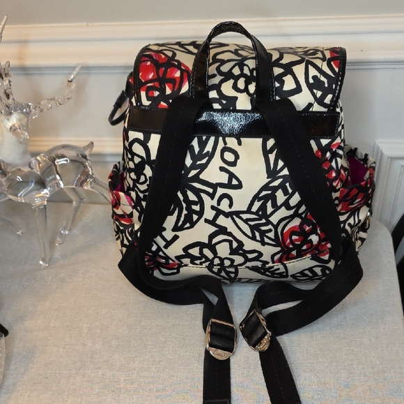 coach backpack magnetic black cinch flower Coach Poppy Daisy Floral Graffiti nylon backpack